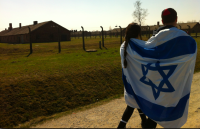 AUSCHWITZ 2013: Like thousands before them, members of this year's senior class wore Israeli flags while walking through the infamous death camp.