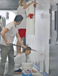 REDO: Judaic Studies Director Reb Noam Weissman pitched in as members of the Class of '13 repainted hallways walls after Senior Prank.