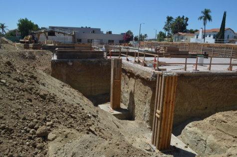 GROUND: Pillars rise toward street level at the site of the new building. 