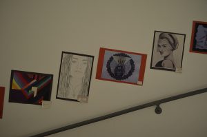 Along the school's staircase are art pieces created by students in Mrs. Roen Salem's AP and 10th grade art classes.