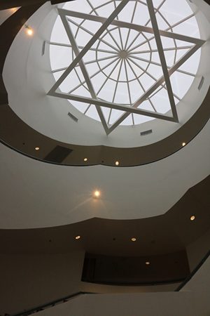 The Magen David skylight entrance on Shalhevet's ceiling, above, resembles the Guggenheim's ceiling, which has its own intricate, geometric design. 