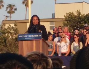 7:08 p.m.: According to Daniel Lorell Rosario Dawson comes up on stage. One thing she said was, "If you're here it means you want healthcare for the strangers around you, you want education for the strangers around you" and "History is written by the winners, so we're going to win."