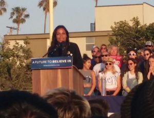 7:08 p.m.: According to Daniel Lorell Rosario Dawson comes up on stage. One thing she said was, "If you're here it means you want healthcare for the strangers around you, you want education for the strangers around you" and "History is written by the winners, so we're going to win." 