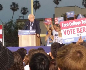 Photo of Bernie speaking at 8:04 p.m.. Photo by Daniel Lorell