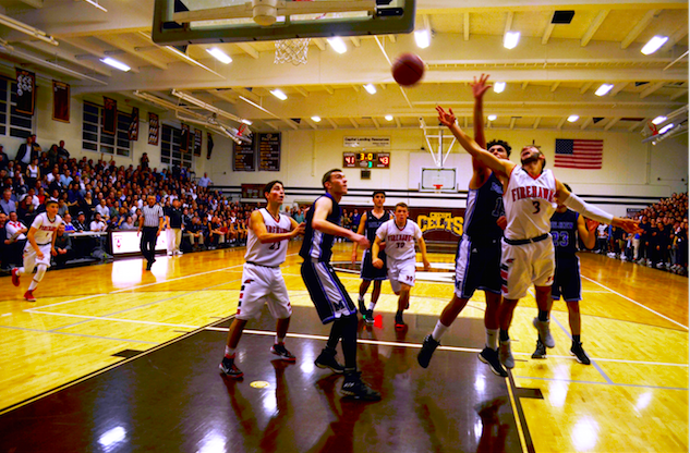 AIRBORNE%3A+No.+3+Eitan+Halpert+overcomes+a+Wildcat+block+to+score+two+points+late+in+the+third+quarter+in+the+gym+of+Crespi+Carmelite+High+School+in+Encino+March+1.++